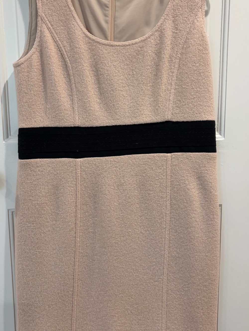 Tory Burch Tan Bouclé dress with black paillettes adoring the bottom.